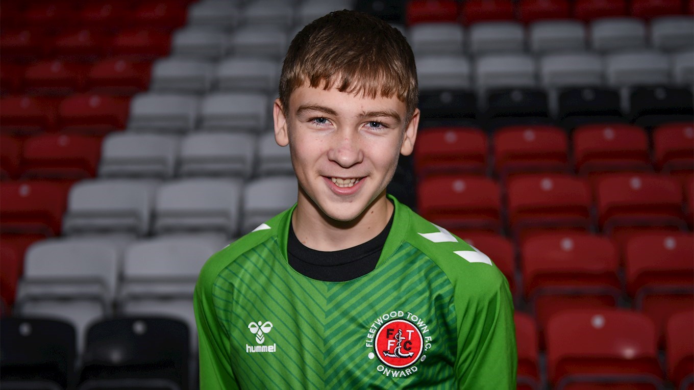 Fleetwood Town goalkeeper Billy Hartley joins Manchester United after a four-year spell at the club's Academy